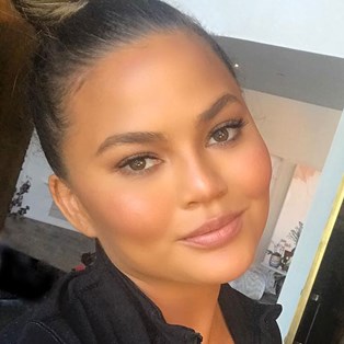 Chrissy Teigen using blackhead strips